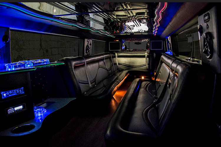 LED lights and built-in coolers in a Hummer limo